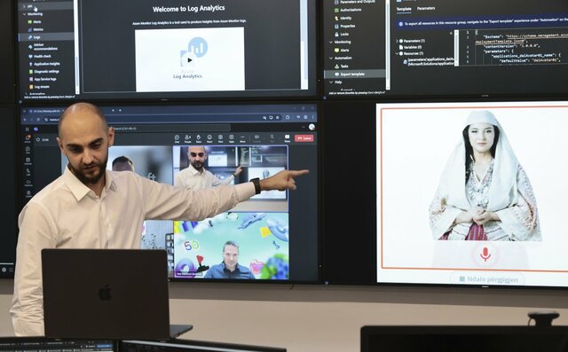 画面に映し出されたアルバニアのAI大臣“ディエラ”（右）